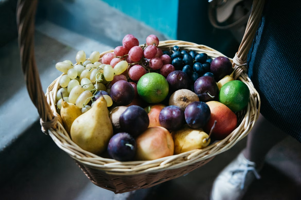 Basket of mixed fruits representing ETF diversification across multiple assets