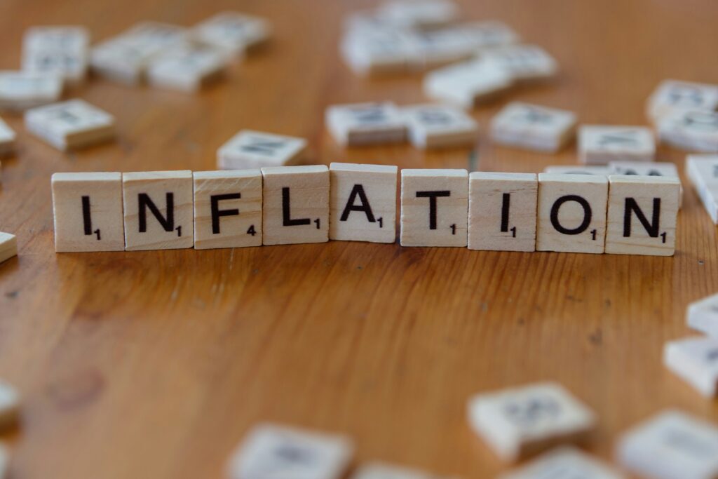 Inflation scrabble tiles representing rising prices and cost of living